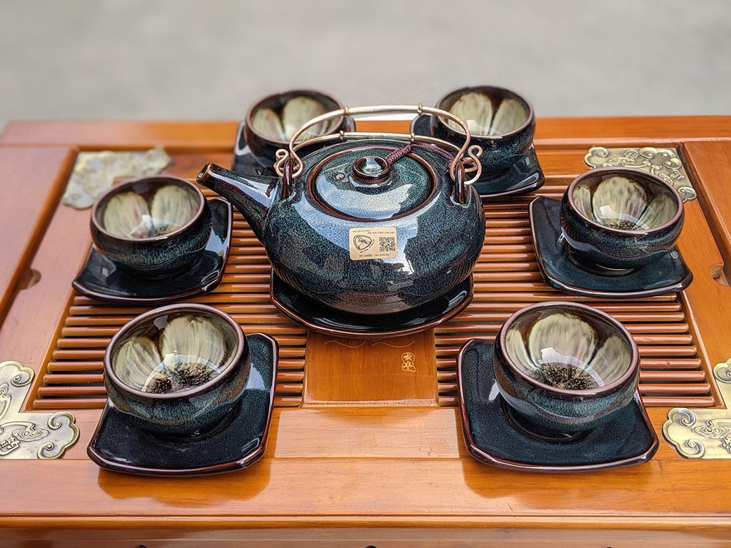 Bộ ấm ch&eacute;n B&aacute;t Tr&agrave;ng men hỏa biến d&aacute;ng Giang T&acirc;y l&ograve;ng ch&eacute;n hoa mặt gần