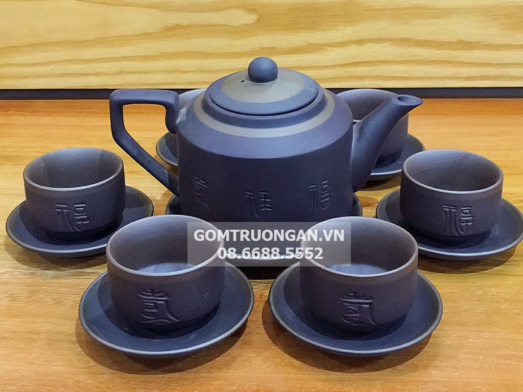 Bộ ấm chén tử sa tích đen lòng chén không tráng men 1