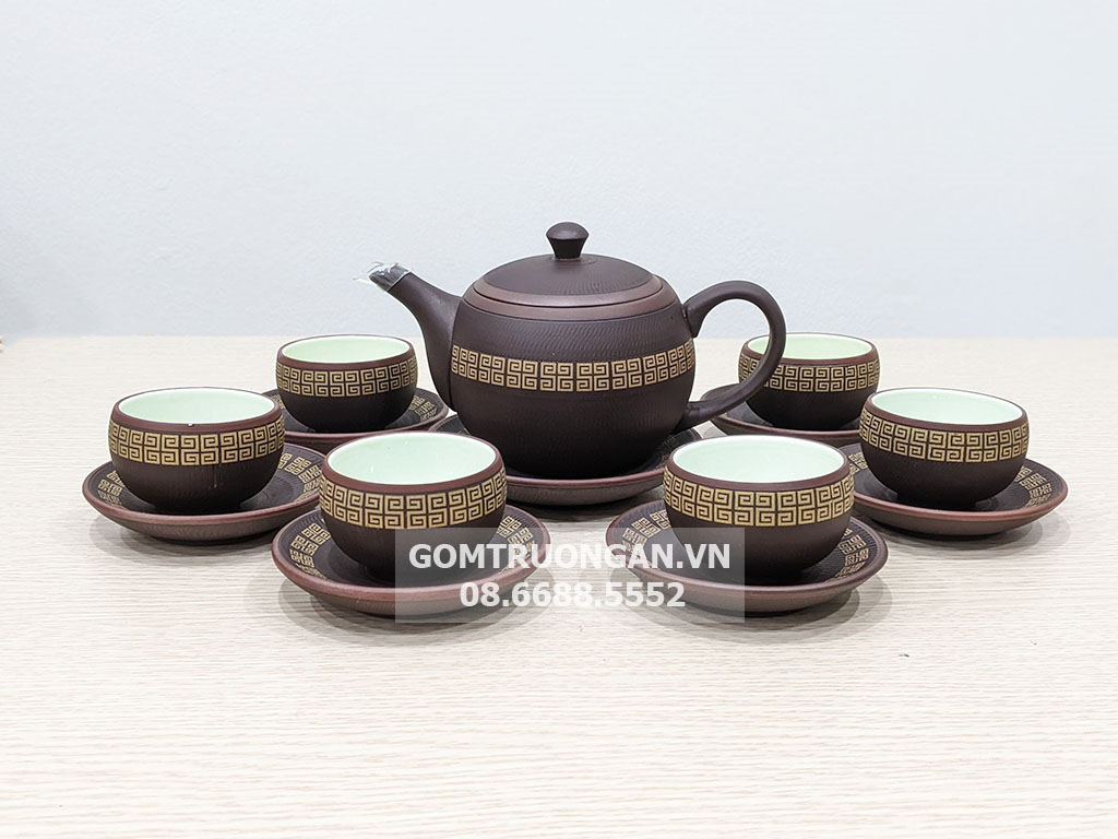 Ấm chén tử sa ghanh nâu chữ Vạn 1